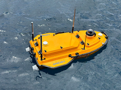 CHCNAV Apache 4 unmanned vessel navigating a lake for hydrographic survey