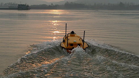 CHCNAV Apache 4 docked near shoreline after a river bathymetry mission