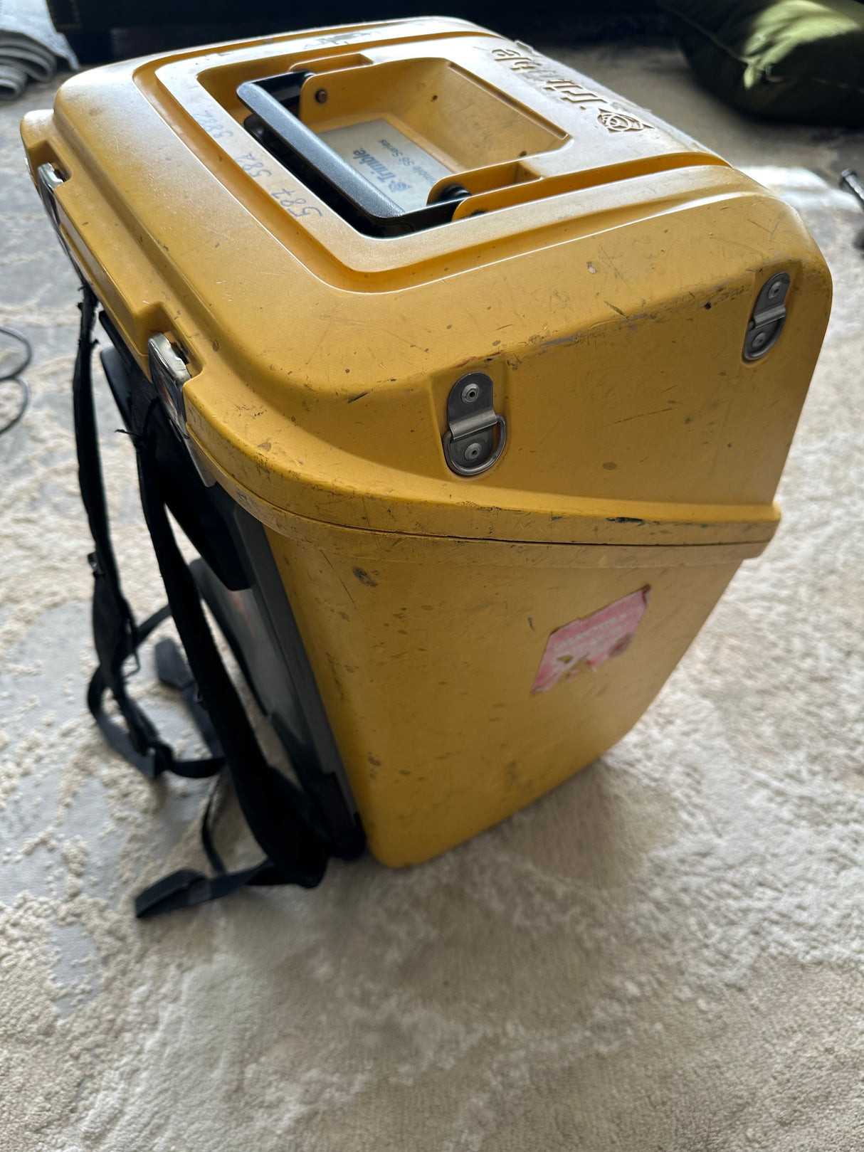 Close-up of 360° mini prism and carbon fiber pole components