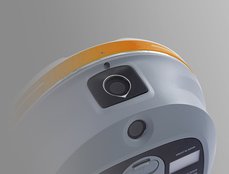 Side view of CHCNAV i93 RTK receiver in use