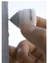 Surveying Precision Prism 17.5 positioned on building wall